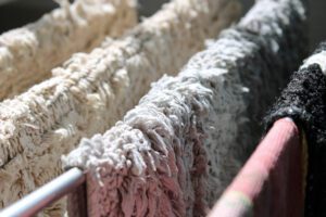 Rugs hanging and drying in the sun