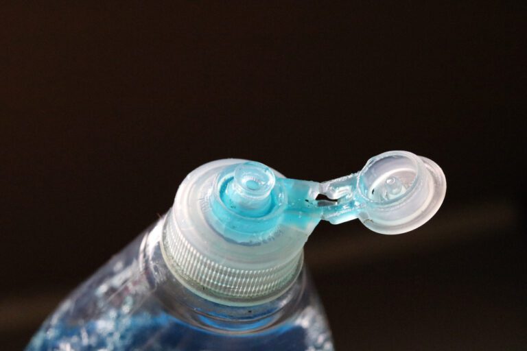 Top of dish soap bottle, blue, open cap